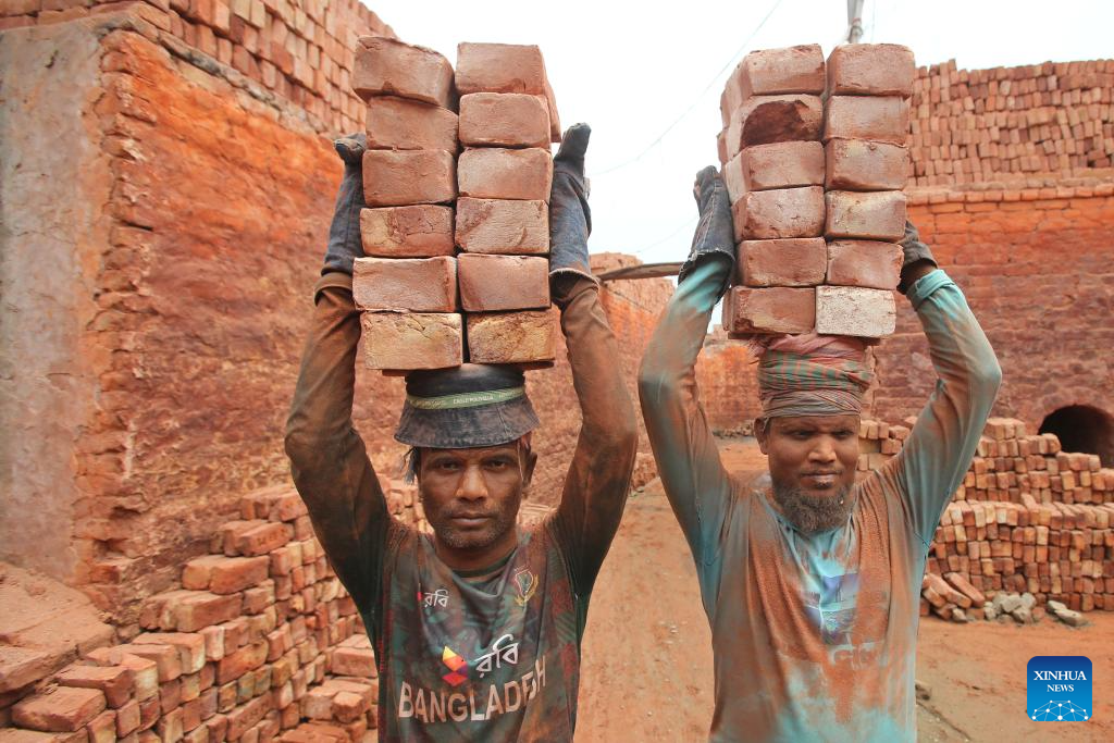 People work at brick factory in Dhaka, Bangladesh