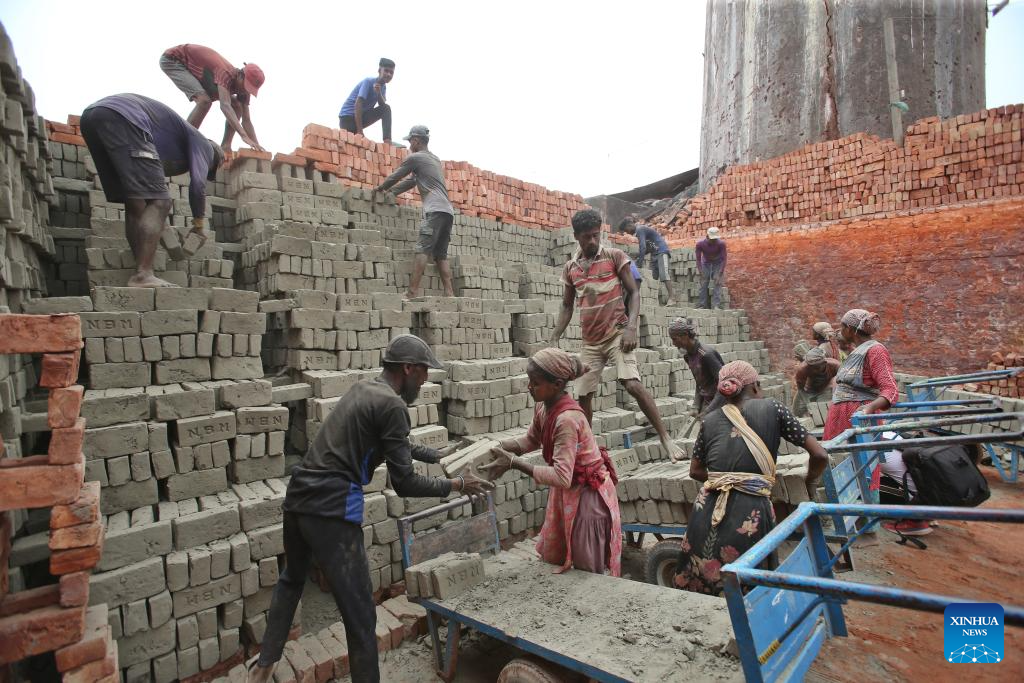 People work at brick factory in Dhaka, Bangladesh