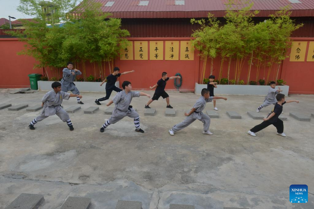 Students practice Shaolin Kung Fu in Phnom Penh, Cambodia