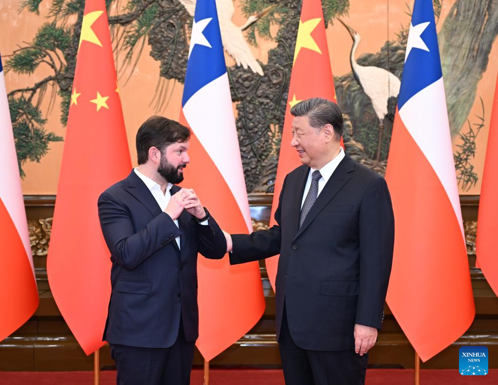 Xi meets Chilean president