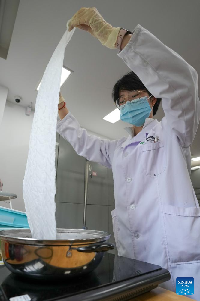 Pic story of silk restorers at Suzhou Silk Museum in China's Jiangsu