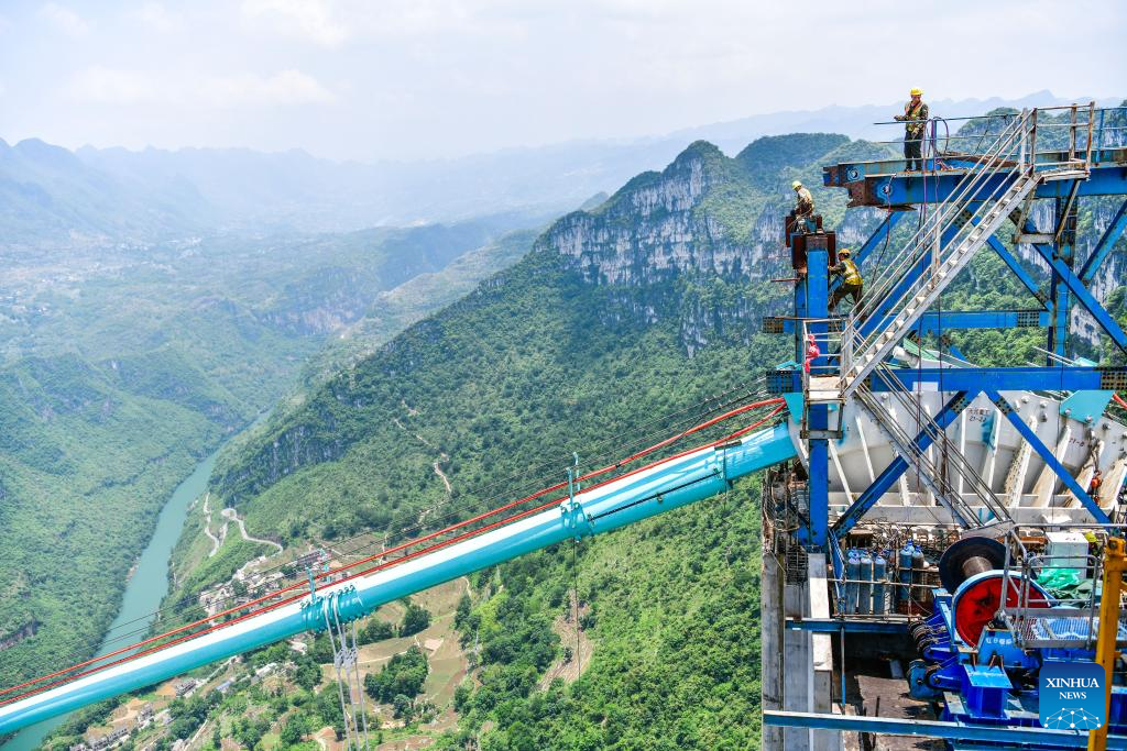 World's tallest bridge nears completion in SW China