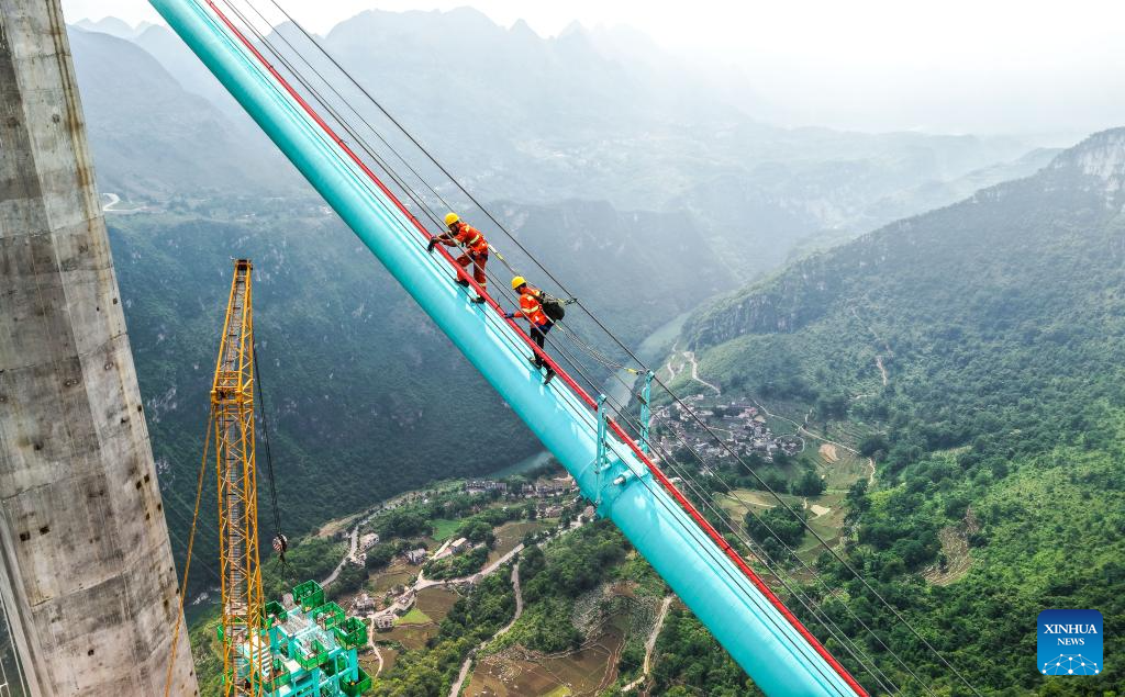 World's tallest bridge nears completion in SW China