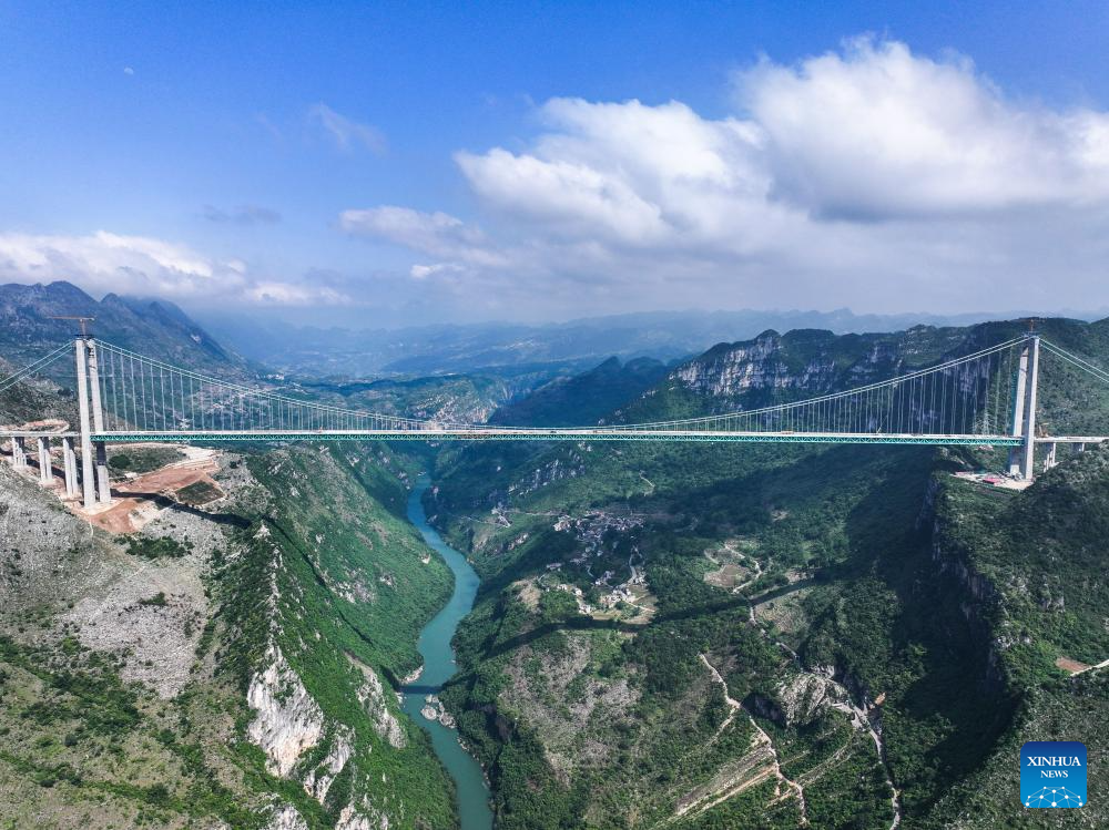World's tallest bridge nears completion in SW China