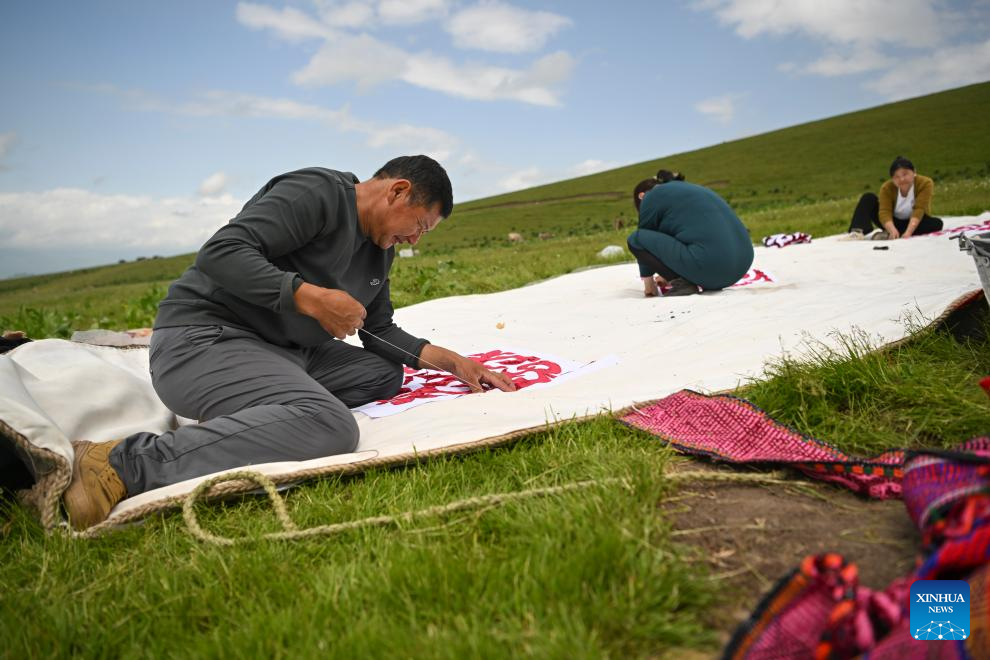 Herder and his summer pasture transfer in NW China's Xinjiang