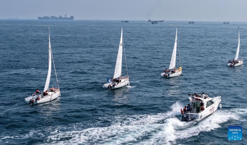 Cruising event held in Qingdao to celebrate 20th anniv. of establishment of Maritime Day of China