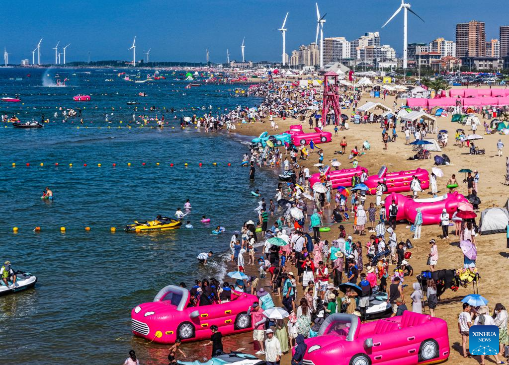 Heatwaves during summer vacation boost cooling economy across China