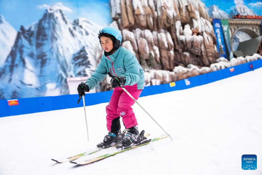 People enjoy themselves at indoor ski resort in Changsha