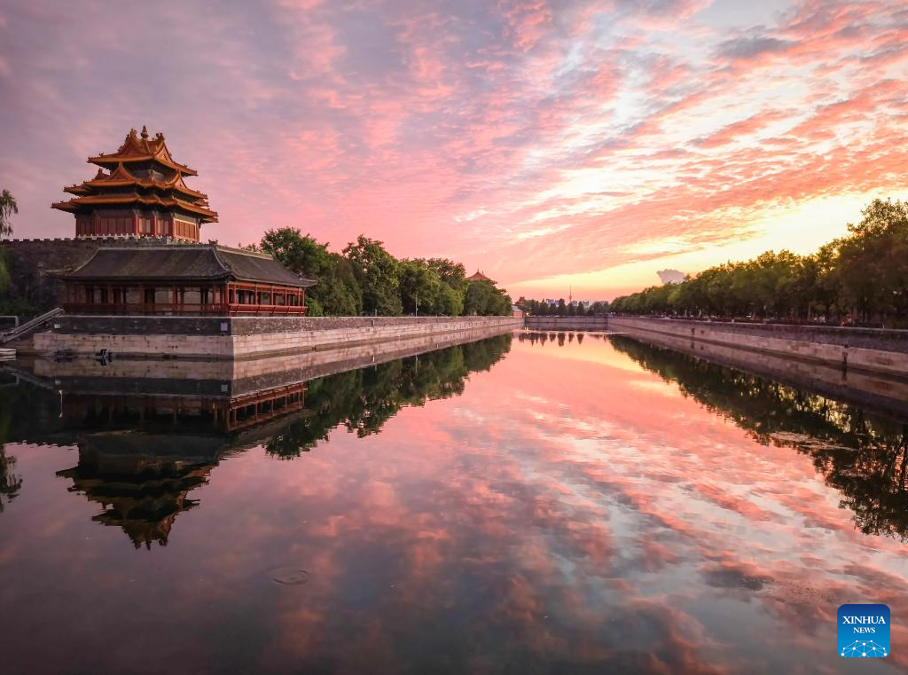 Turret of Palace Museum bathed in evening glow in Beijing