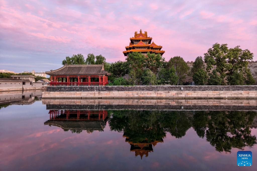 Turret of Palace Museum bathed in evening glow in Beijing