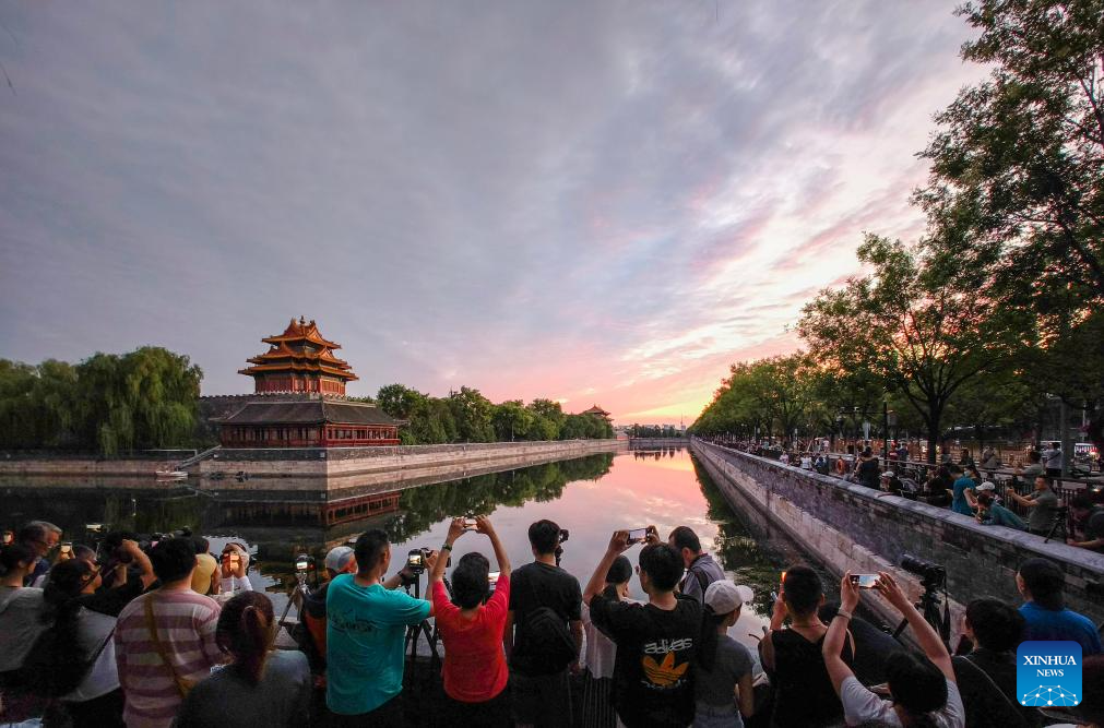 Turret of Palace Museum bathed in evening glow in Beijing
