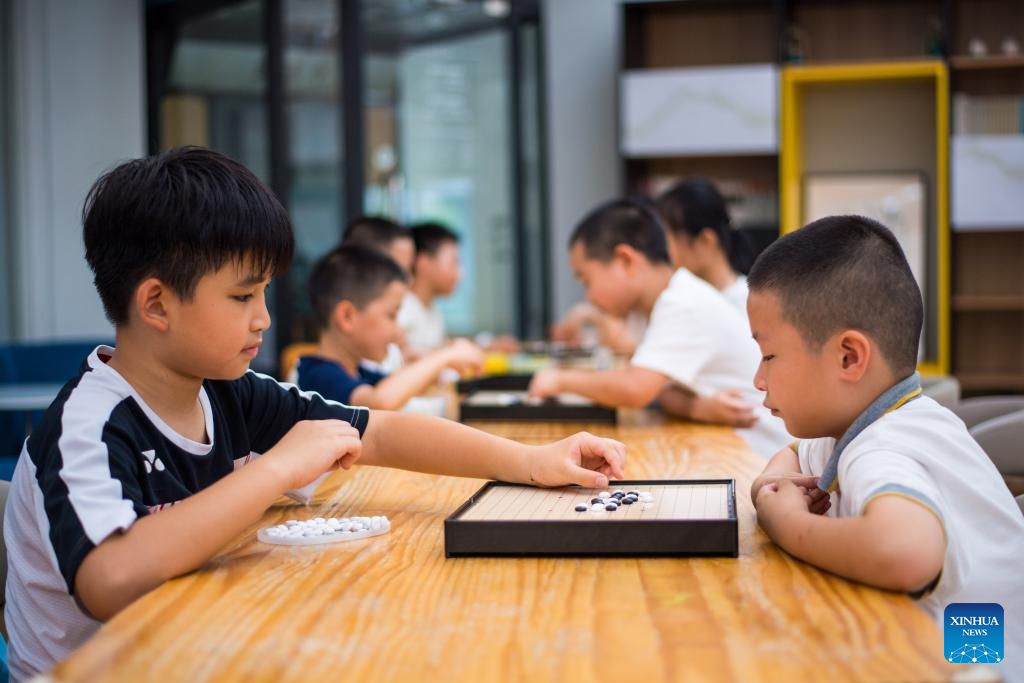 Children enjoy various activities at community service centers in Hangzhou