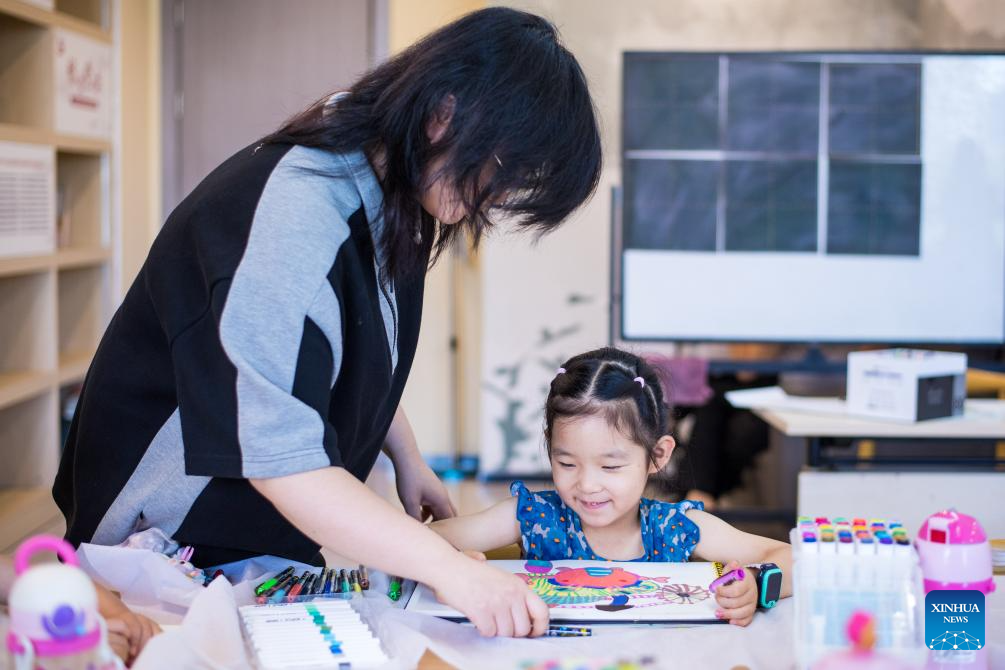 Children enjoy various activities at community service centers in Hangzhou