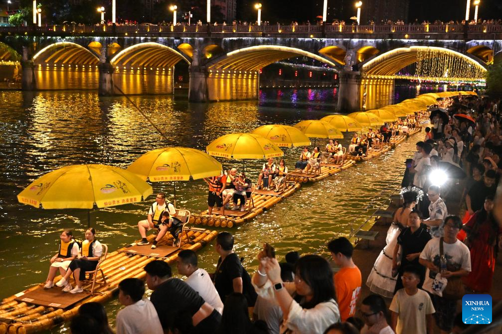 Heat waves boost water-related activities, night tours in China