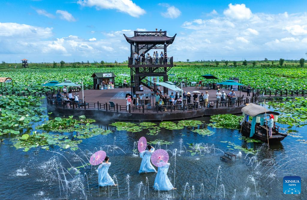 Heat waves boost water-related activities, night tours in China