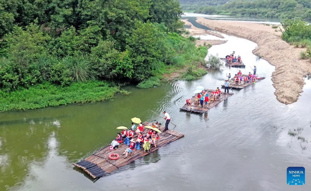 Heat waves boost water-related activities, night tours in China