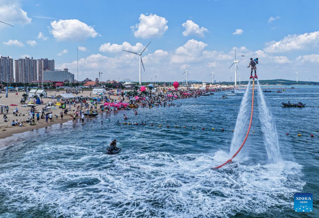 Heat waves boost water-related activities, night tours in China