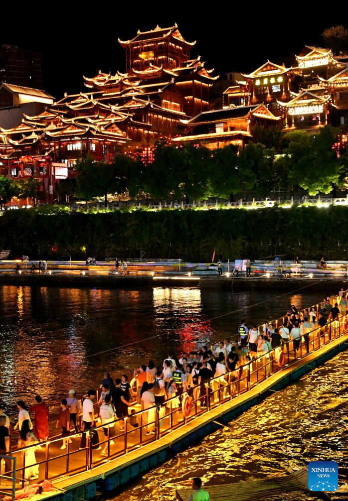 Heat waves boost water-related activities, night tours in China