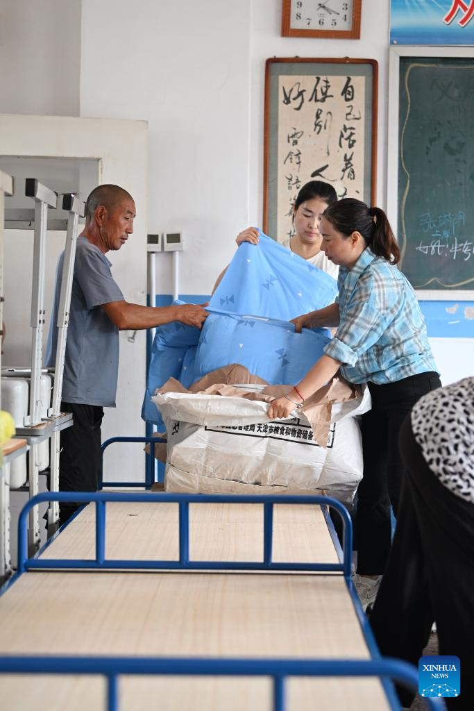Emergency operations underway for flood-hit villages in north China's Tianjin