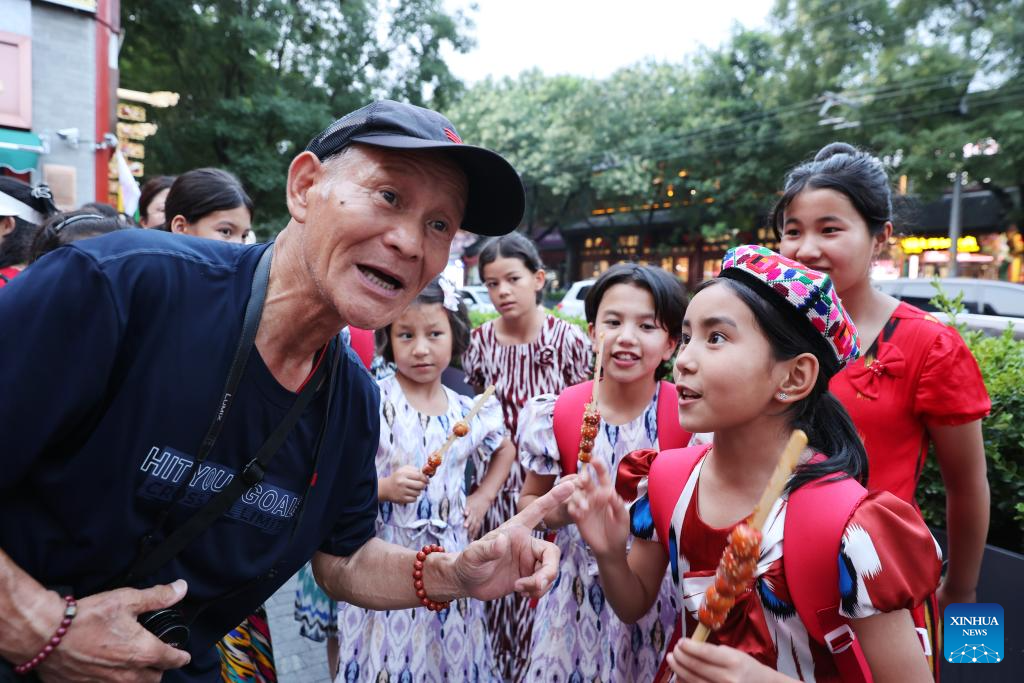 Xinjiang youths participate in 11-day public welfare summer camp in Beijing