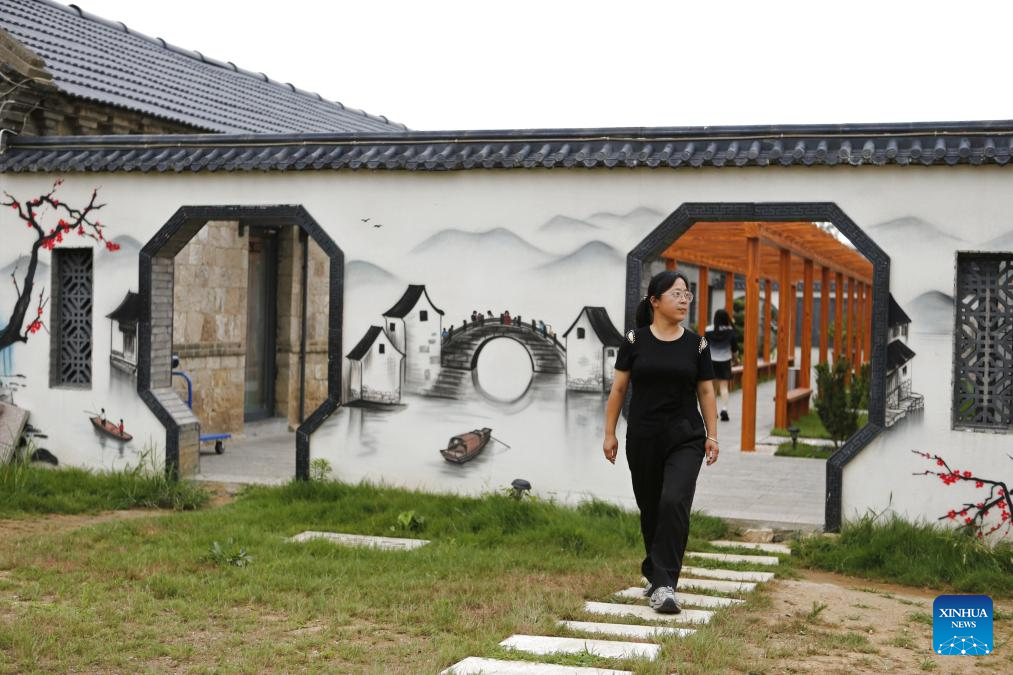 Laixi city in E China transforms abandoned mine pit into resort to promote ecology