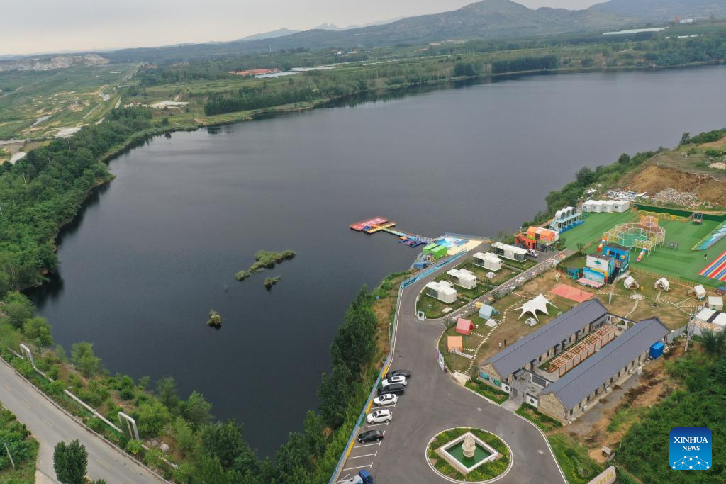 Laixi city in E China transforms abandoned mine pit into resort to promote ecology