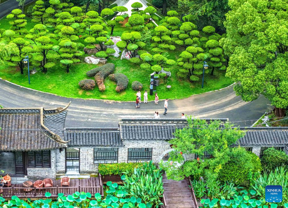 People enjoy summer vacation across China