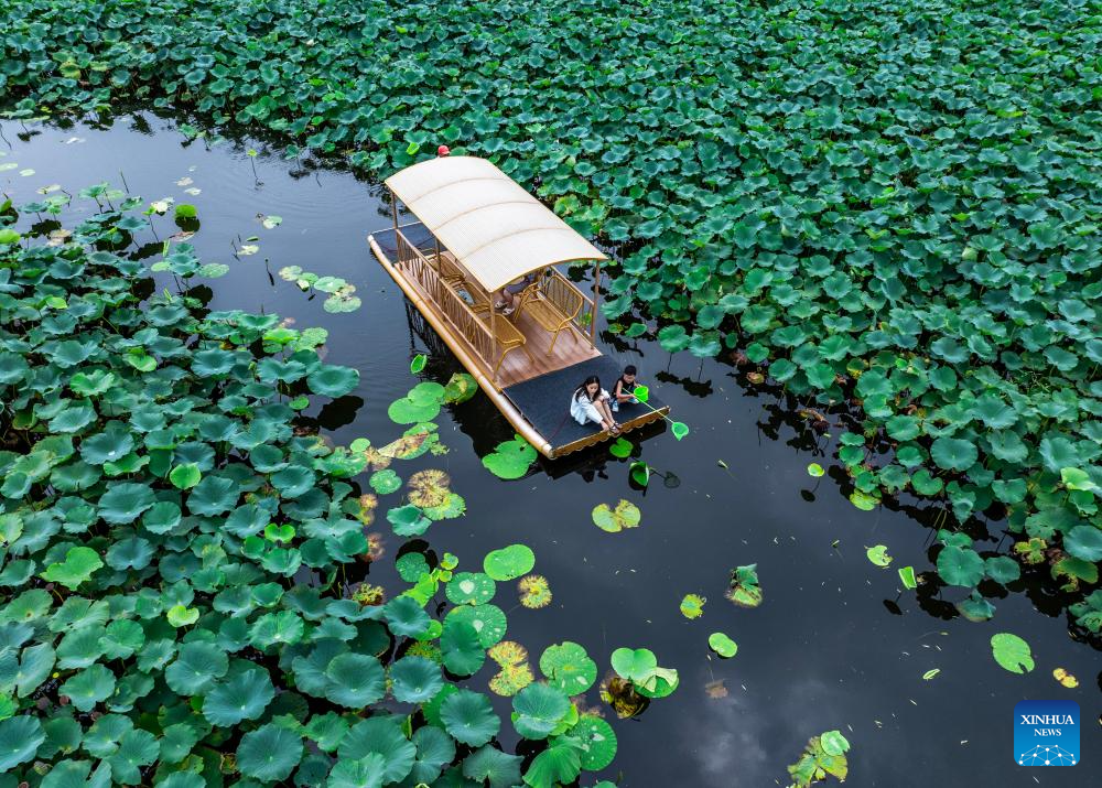 Summer travel in full swing across China