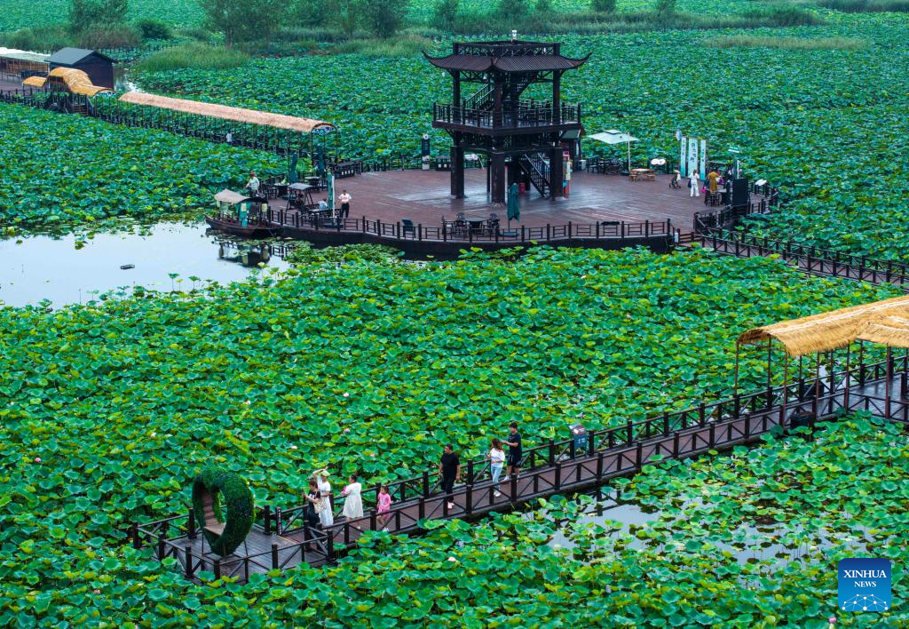 Summer travel in full swing across China