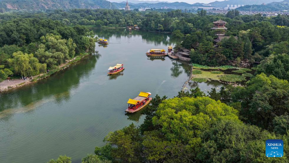 Summer travel in full swing across China