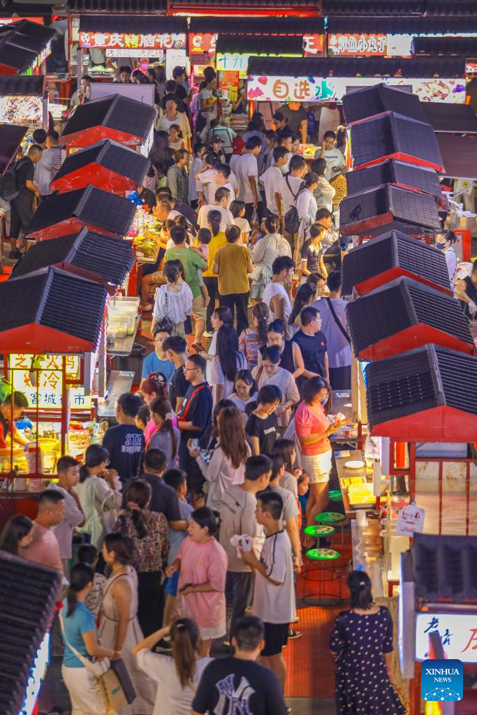 Summer travel in full swing across China