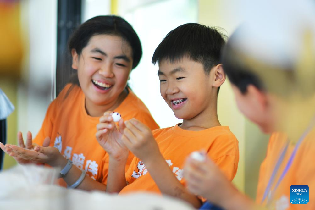 Children across China enjoy various activities during summer vacation