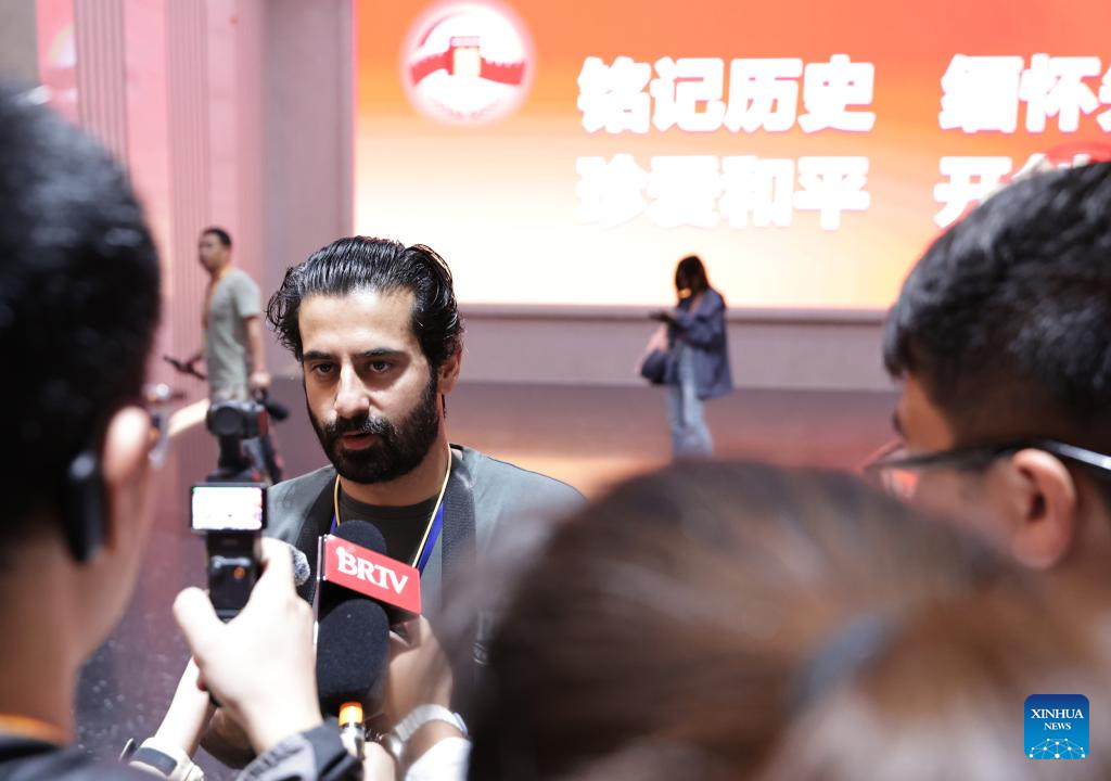 Journalists from home and abroad visit Museum of War of Chinese People's Resistance Against Japanese Aggression in Beijing
