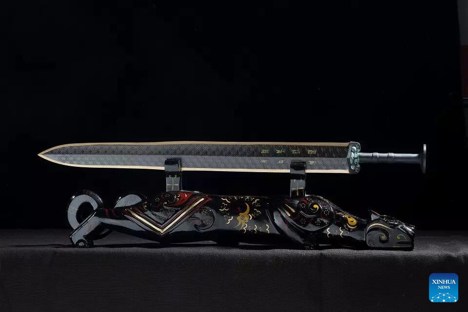 Chinese craftsmen uphold national intangible cultural heritage of Lead-Tin Engraving