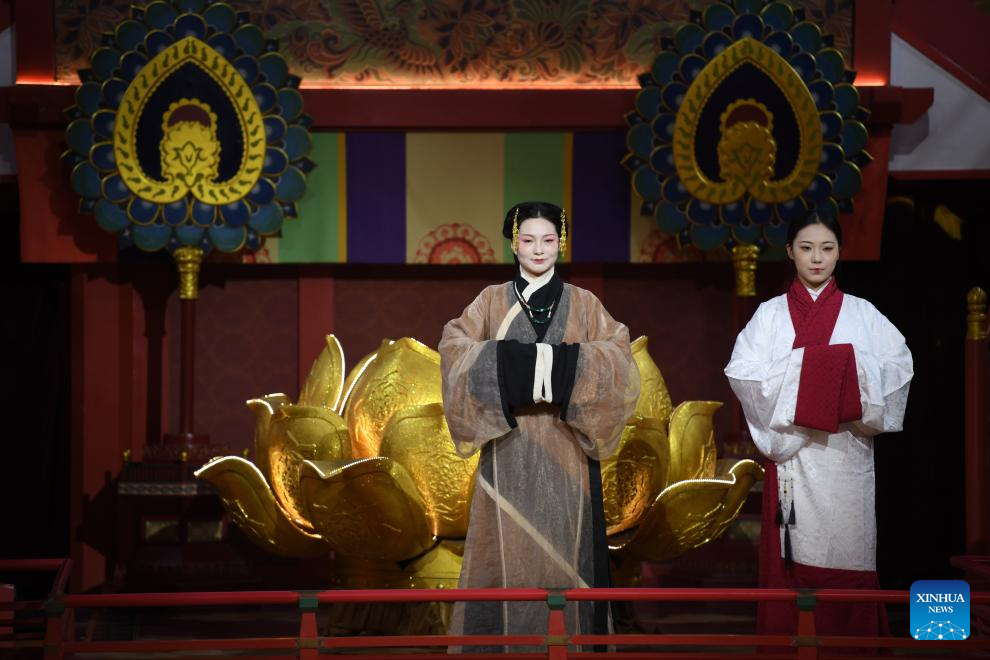 Traditional costumes displayed at theme block in NW China