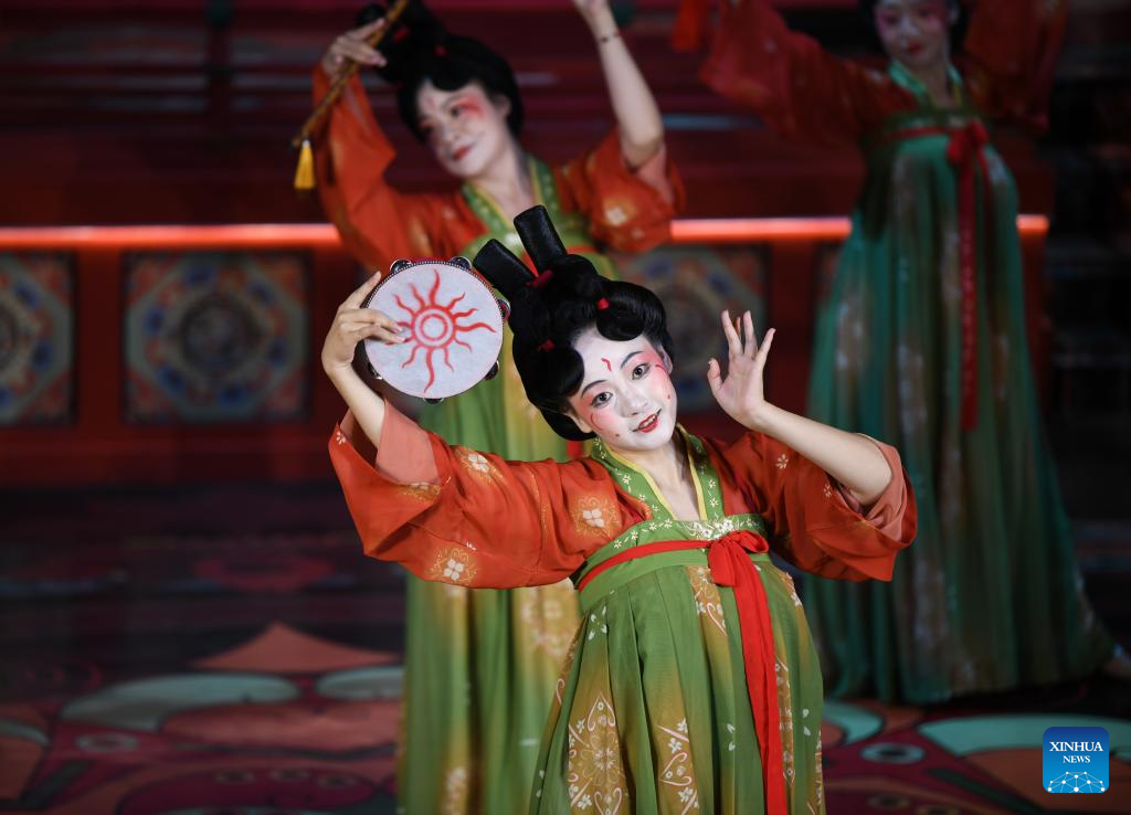 Traditional costumes displayed at theme block in NW China