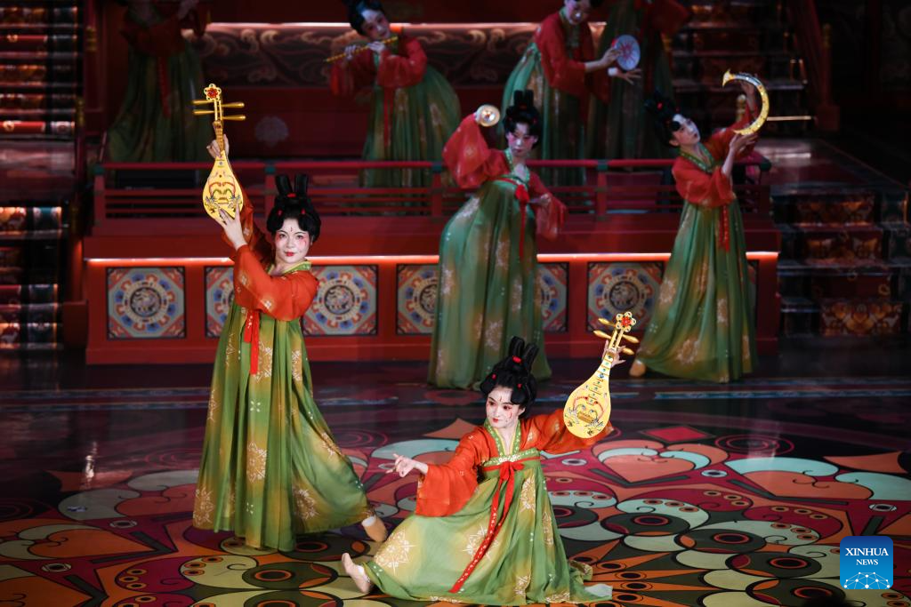 Traditional costumes displayed at theme block in NW China