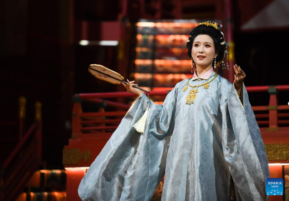 Traditional costumes displayed at theme block in NW China