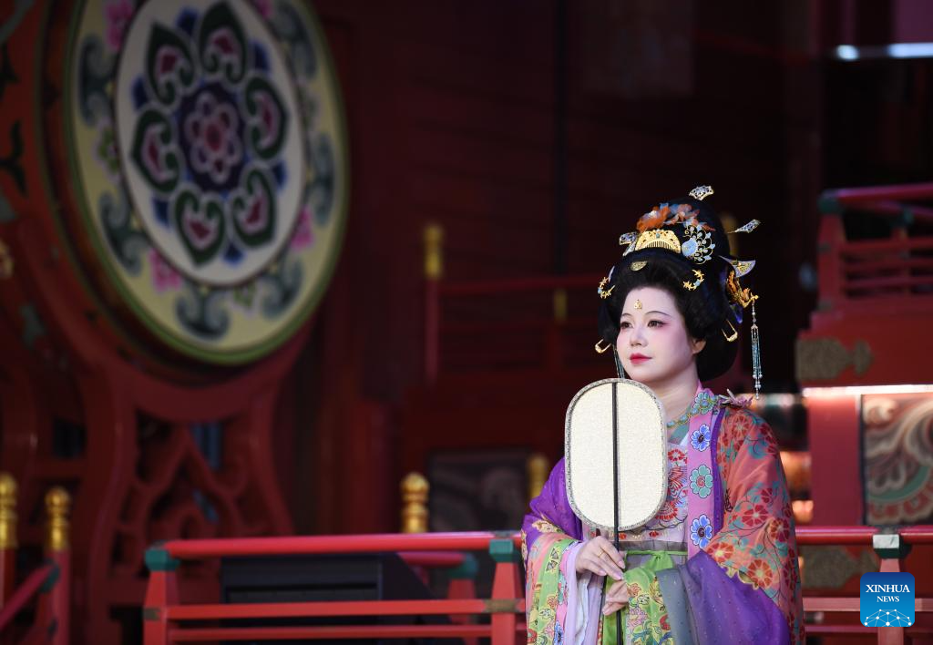 Traditional costumes displayed at theme block in NW China