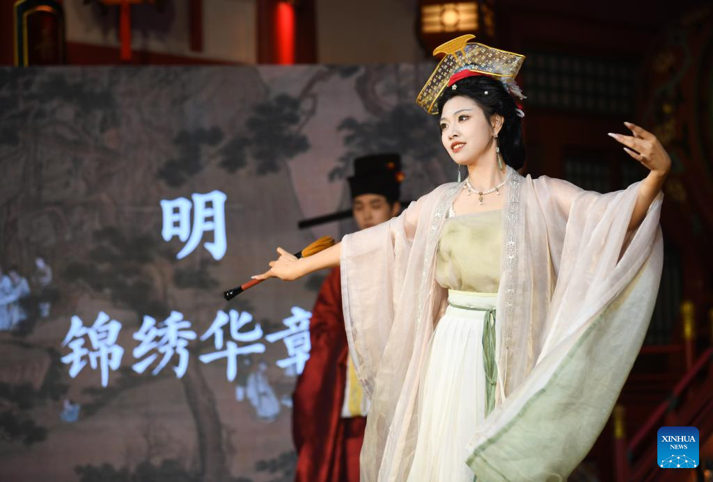 Traditional costumes displayed at theme block in NW China