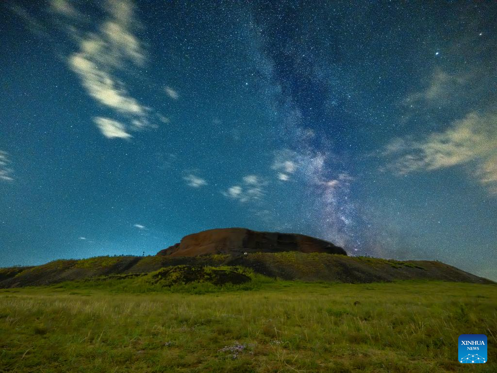 View of volcano beneath the Milky Way in north China's Inner Mongolia