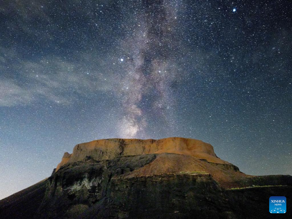 View of volcano beneath the Milky Way in north China's Inner Mongolia