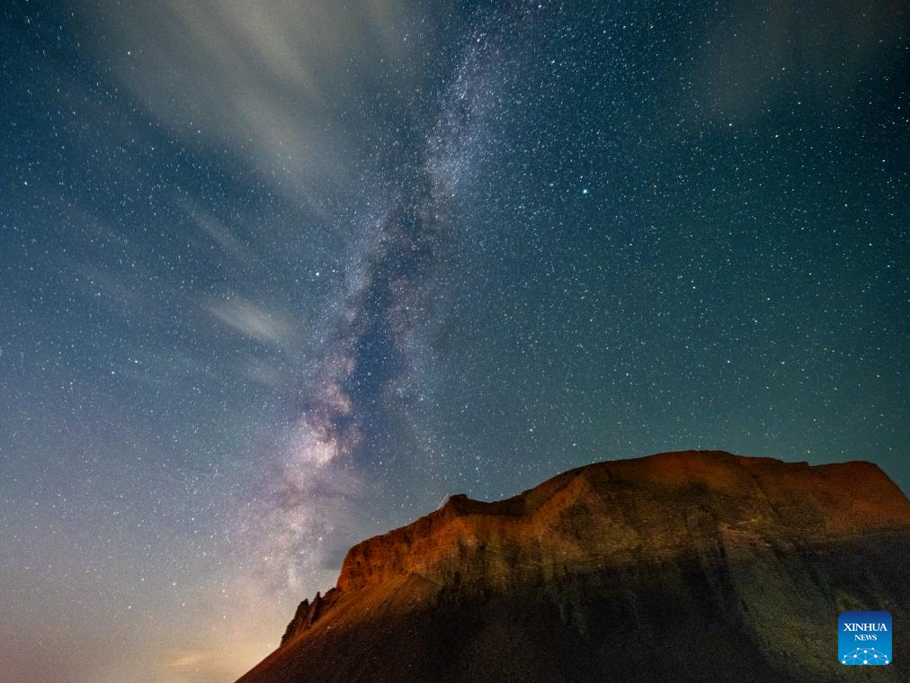 View of volcano beneath the Milky Way in north China's Inner Mongolia