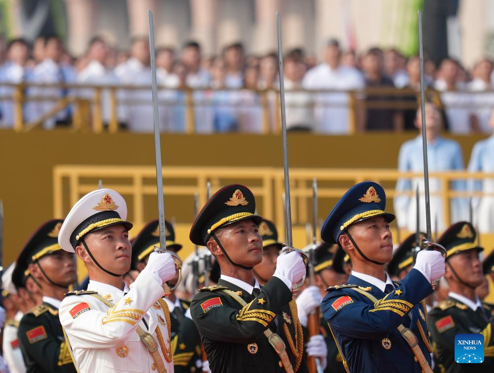 PLA guards of honor formation marches through Tian'anmen Square