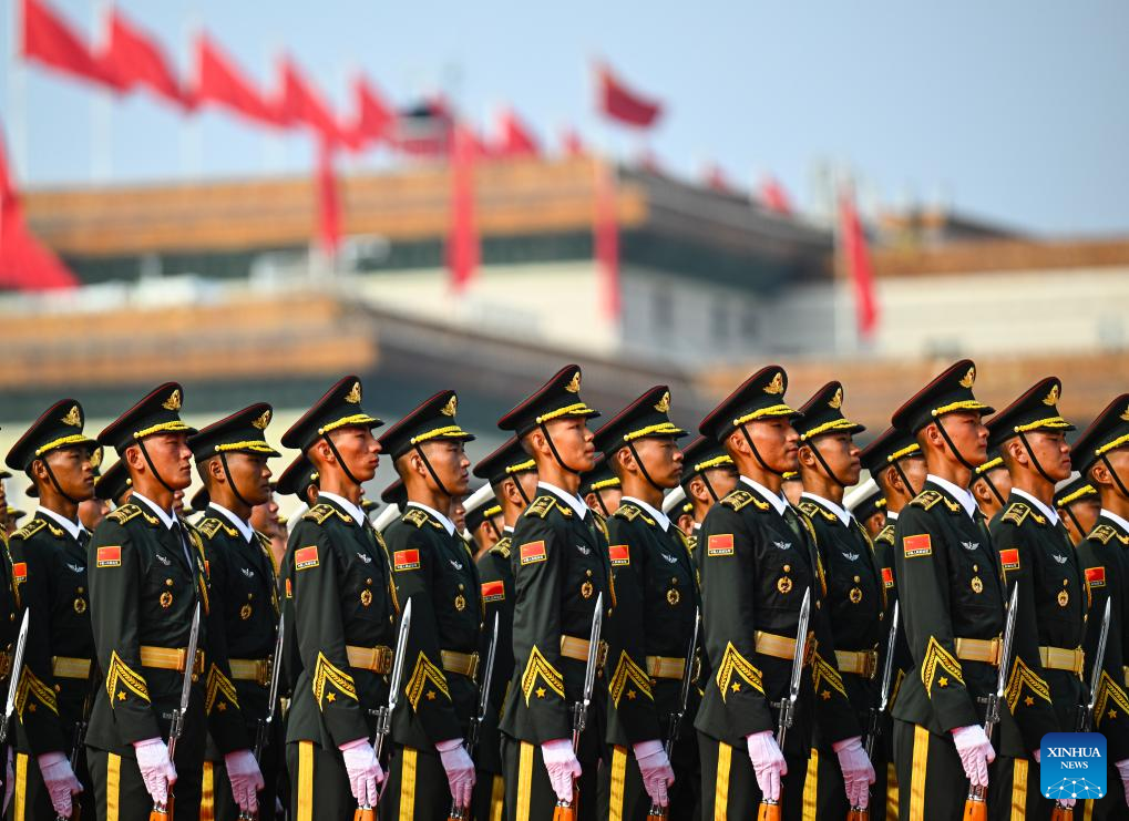 PLA guards of honor formation marches through Tian'anmen Square