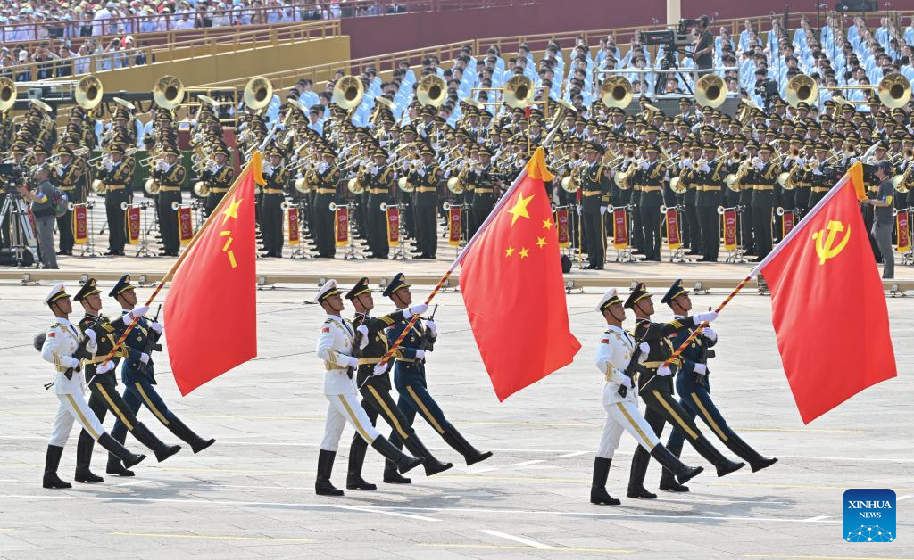 PLA guards of honor formation marches through Tian'anmen Square