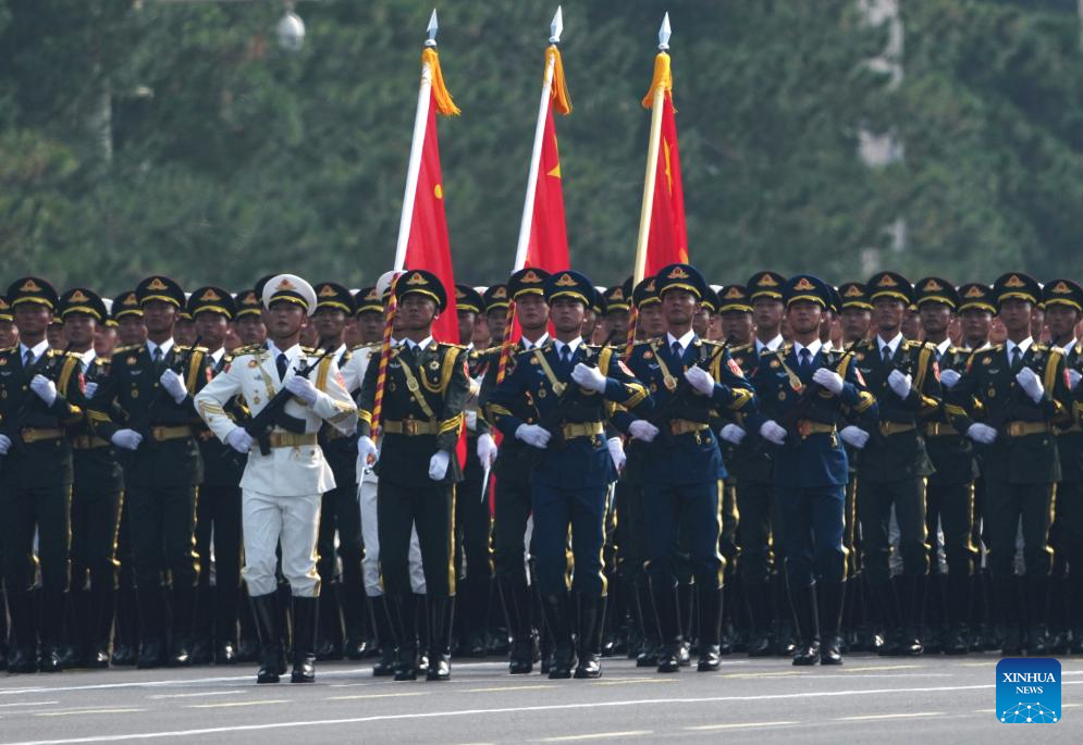 PLA guards of honor formation marches through Tian'anmen Square