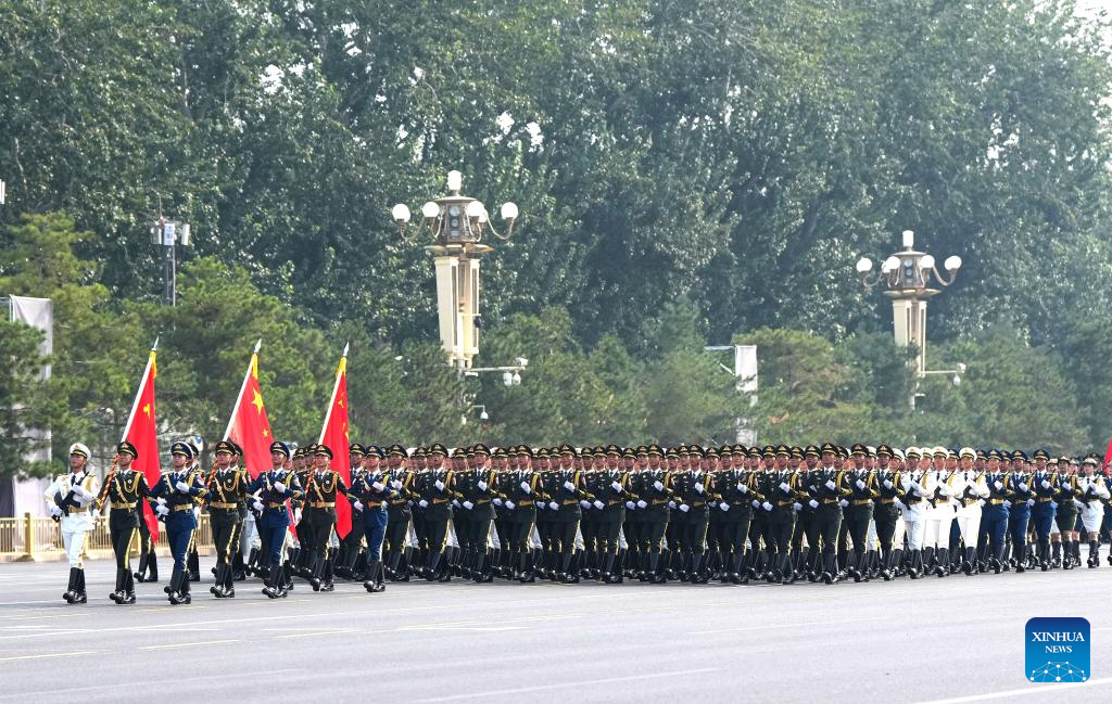 PLA guards of honor formation marches through Tian'anmen Square