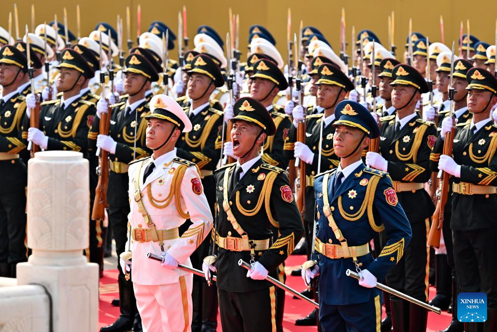 PLA guards of honor formation marches through Tian'anmen Square