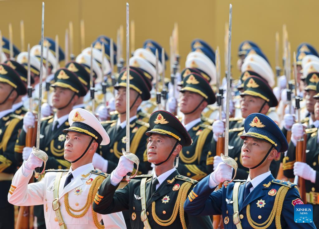 PLA guards of honor formation marches through Tian'anmen Square